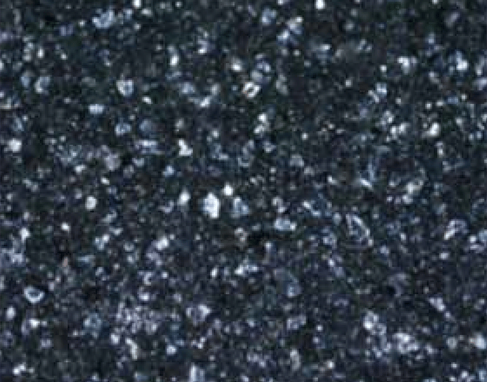 Pigment destruction by high-shear forces during bonding.