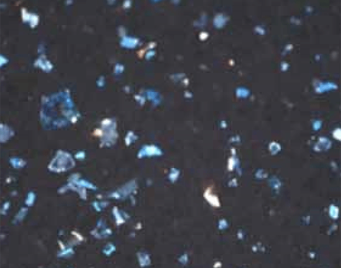 Pigment destruction by high-shear forces during bonding.