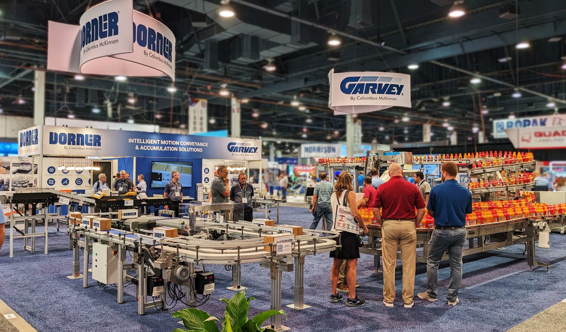 PACK EXPO attendees visiting the Dorner and Garvey booth