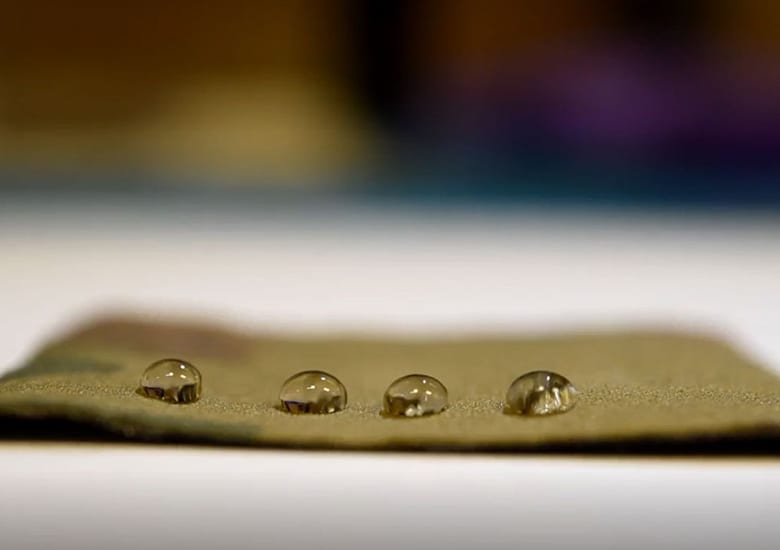 Nanoscale Fletching Enables Low-PFAS Repellent Coating Alternative