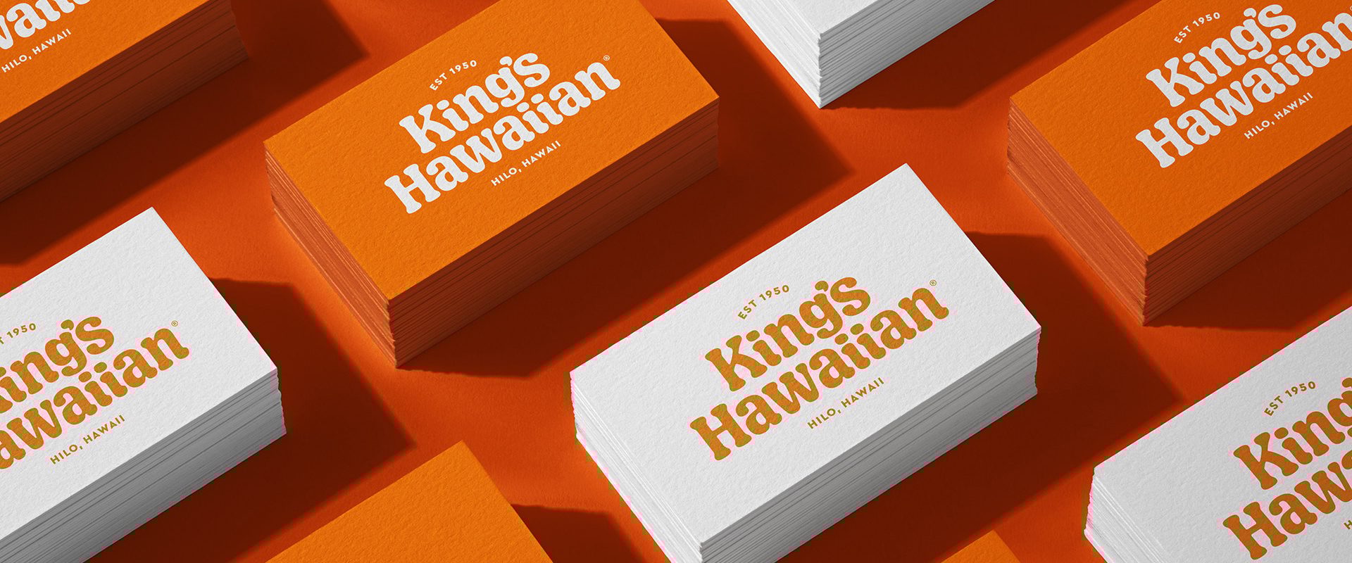 Stack of King’s Hawaiian cards featuring the new font.