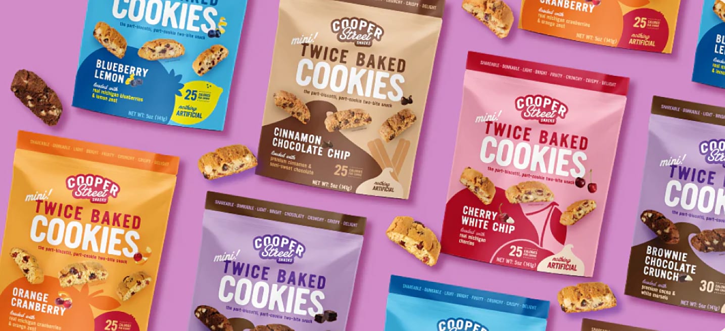 Various flavors of Cooper Street Cookies on lavender background