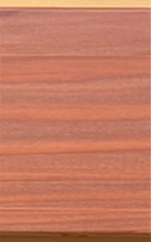 Reddish-brown wood grain texture.Appearance of low-sheen clear coating formulated with MT-8 and a control commercial acrylic coating. Three brush-applied coats over redwood