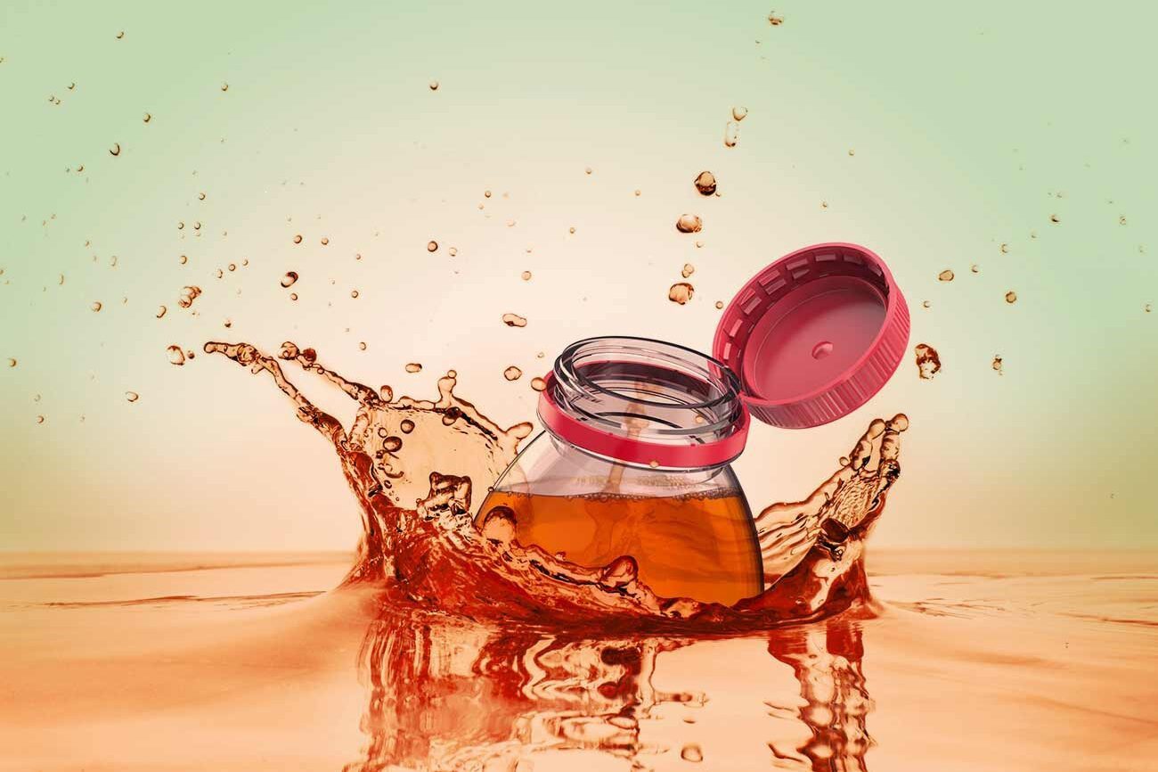 Image of a bottle with a tethered cap
