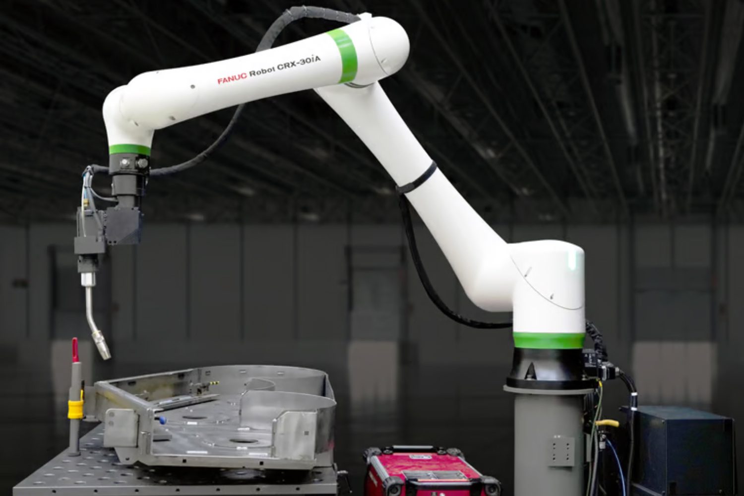 Still shot of AMT’s FANUC CRX-30iA robot in manufacturing facility