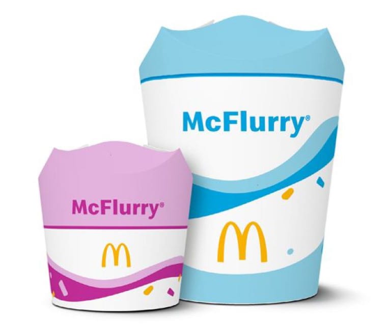 Empty McFlurry standard size packaging next to miniature packaging