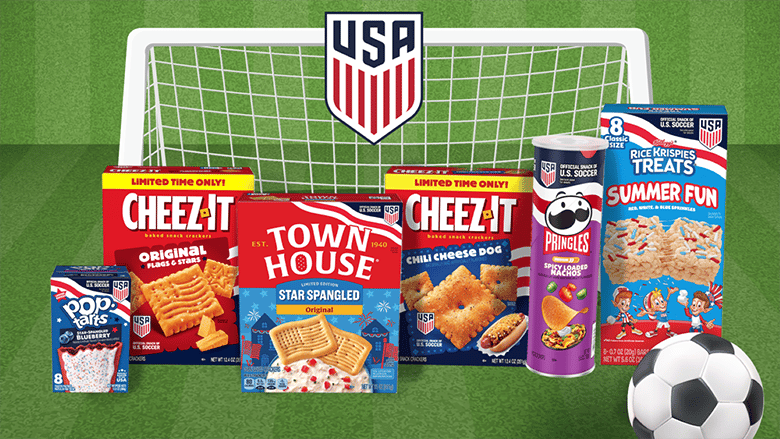 Full lineup of Kellanova snacks part of the US Soccer partnership with a soccer field and goal in the background