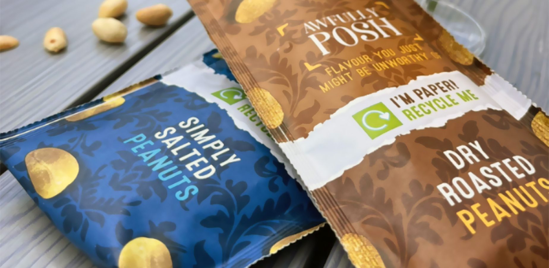 Awfully Posh peanut packaging on wooden table