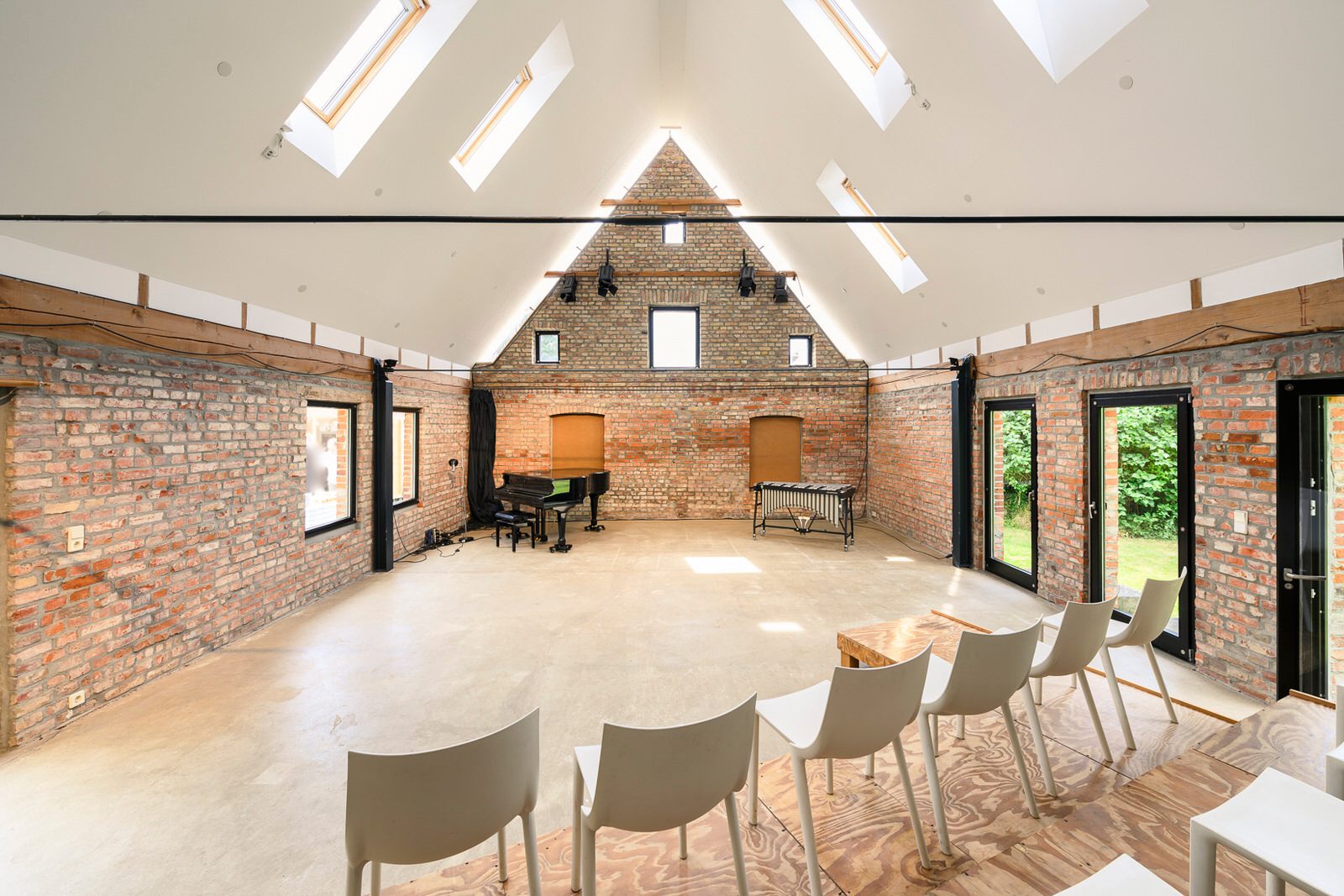 Interior design, Living room, Furniture, Table, Wood, Chair, Building, Architecture, Flooring, Window