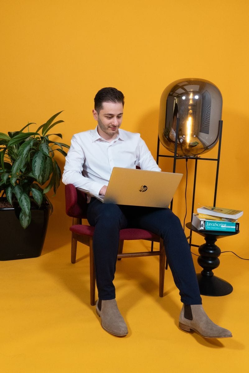 Personal computer, Furniture, Plant, Flowerpot, Laptop, Chair, Comfort, Houseplant