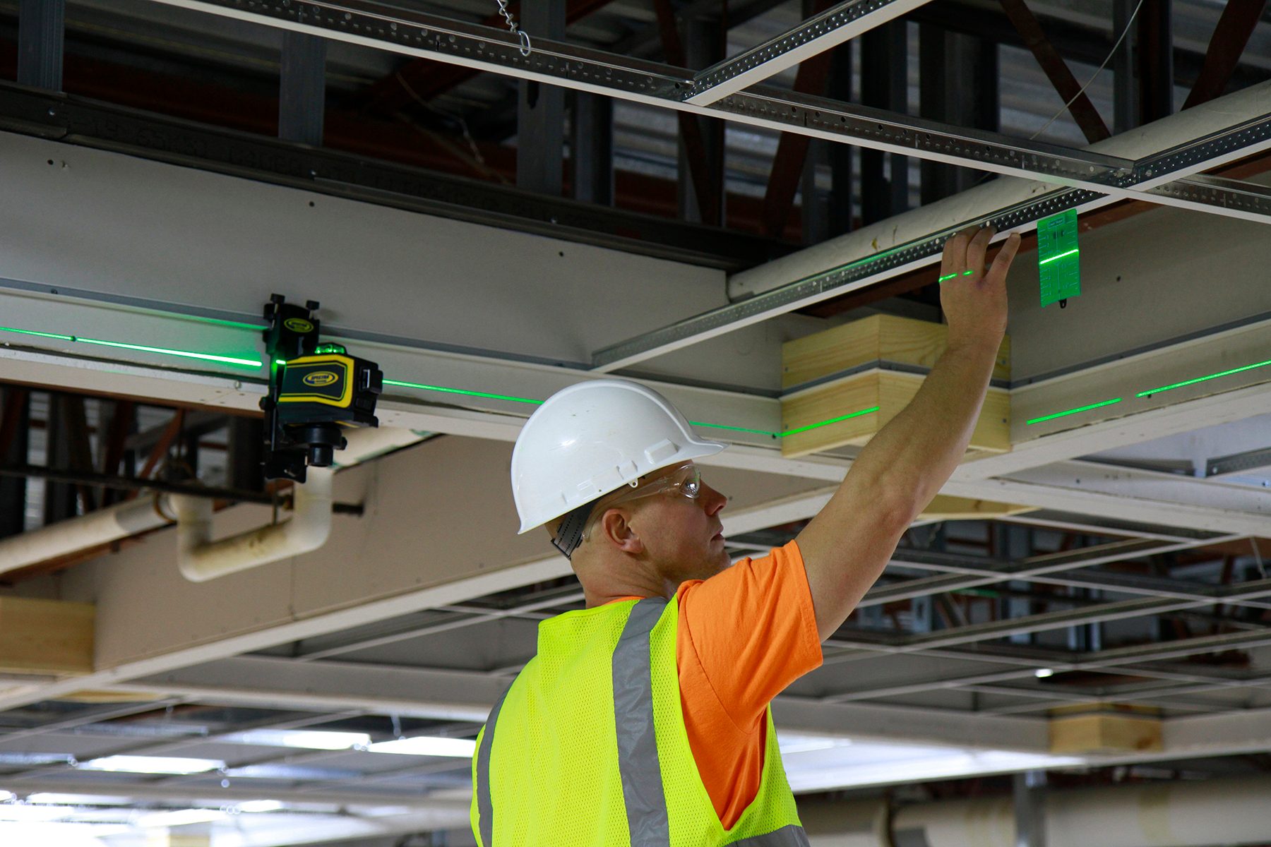 green beam line laser used for ceiling grid installation