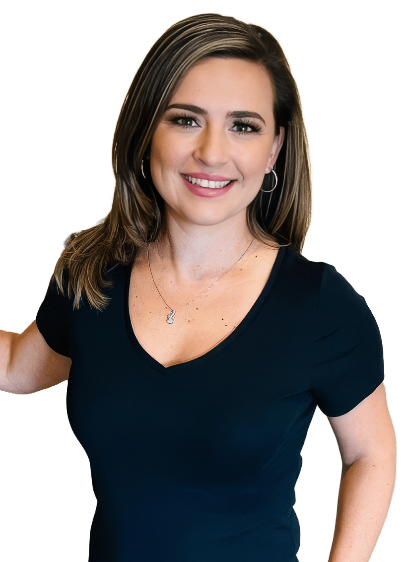 A smiling woman with long brown hair and a dark V-neck shirt, wearing hoop earrings and a necklace.