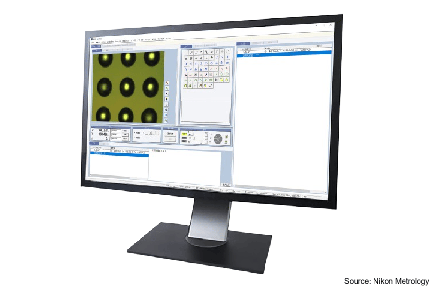 A black computer monitor displaying metrology software with a magnified view of circular objects and data panels.