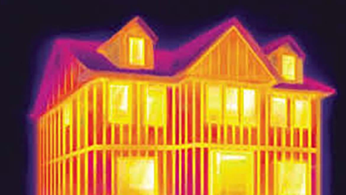 Thermal image of a house showing heat. Yellow/orange is hot, purple/red is cool.