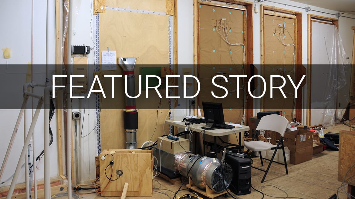 Lab with testing equipment, partially built walls, and "FEATURED STORY" text overlay.