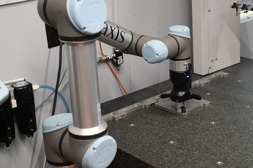 Teach universal cobots to load and unload inspection setups