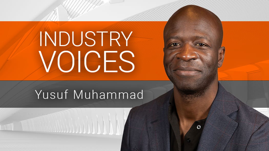 Yusuf Muhammad, a Black man, smiles, next to 'Industry Voices' text on an orange and grey background.