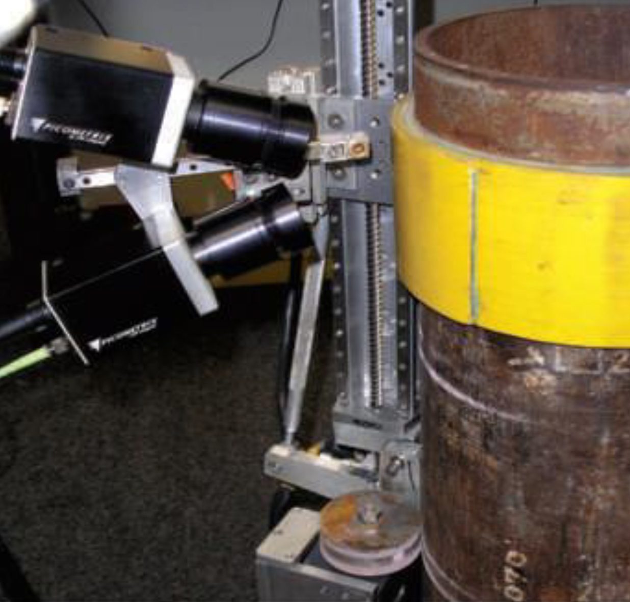 A rail-mounted THz scanner checking pipe integrity, quality of insulation and the presence of corrosion under insulation