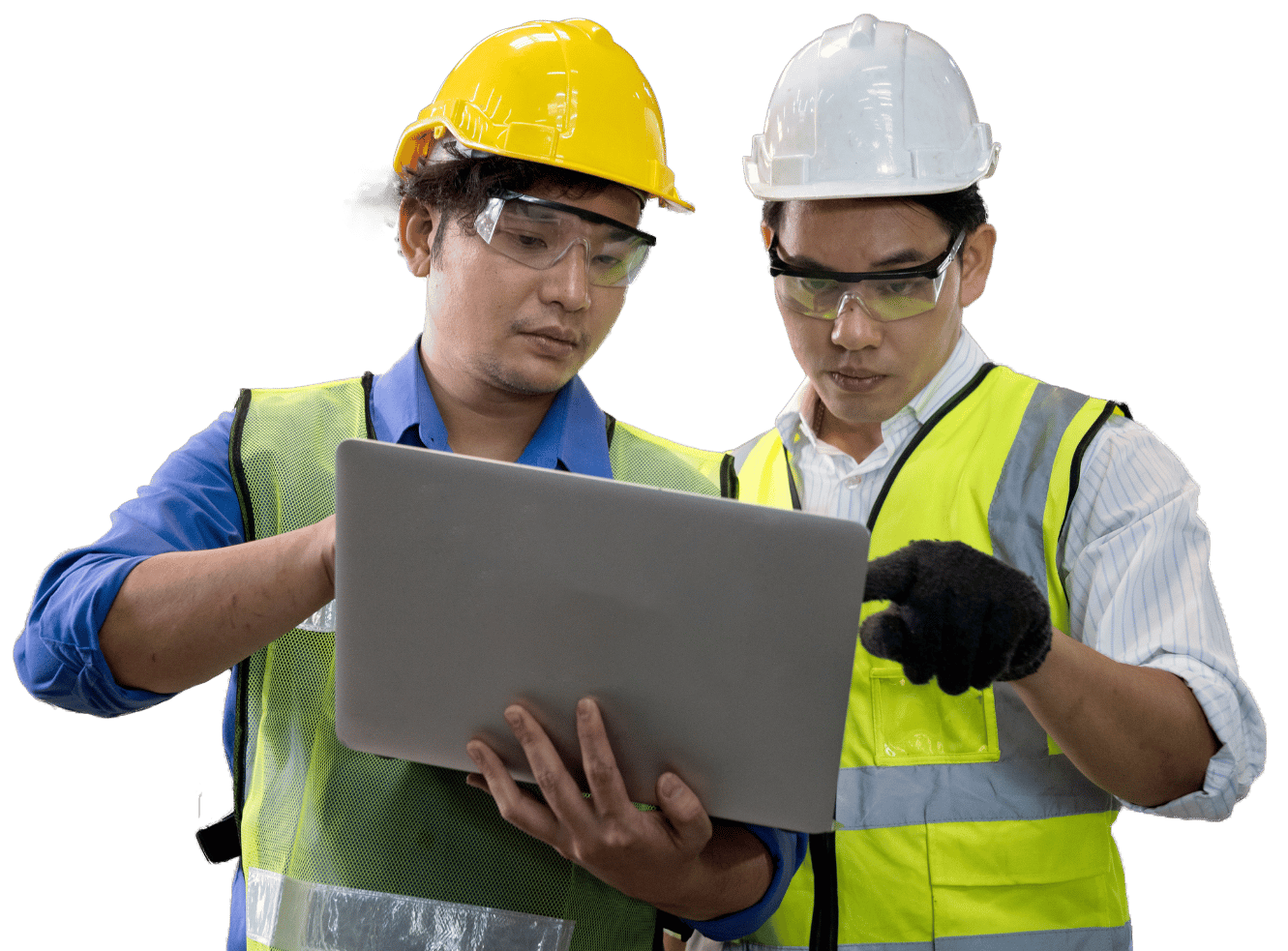 Workers in factory looking at computer