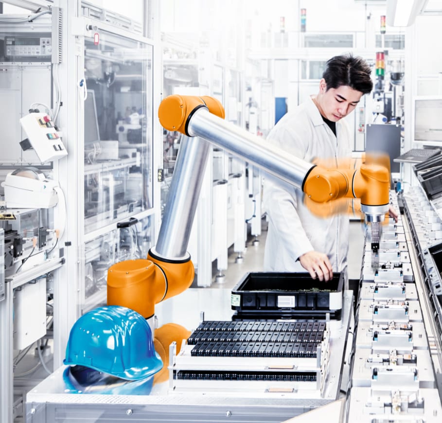 Human and robot collaborative workstation with sensors for item detection and for safe operation to improve overall production.