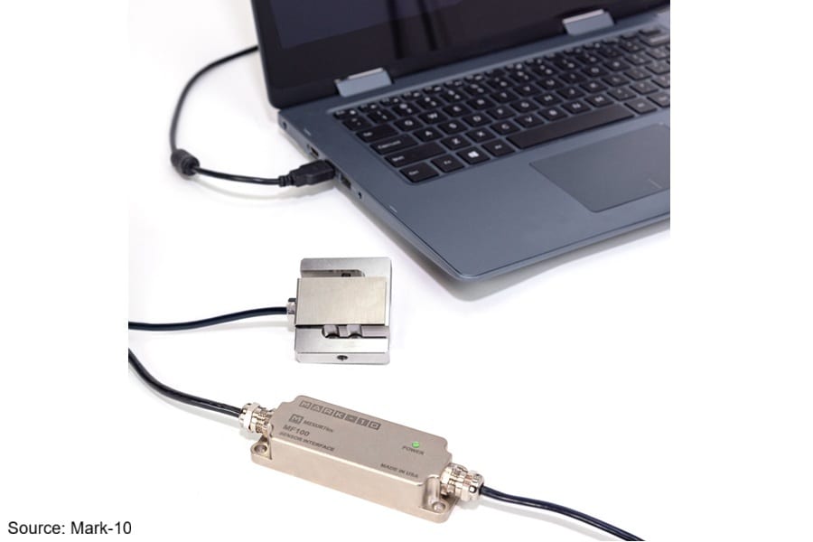 Mark-10 MF100 sensor interface connects a load cell to a laptop.
