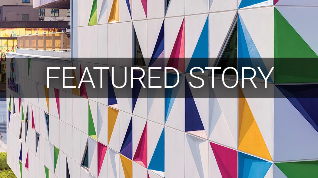 Building facade with colorful triangular windows and "FEATURED STORY" banner.