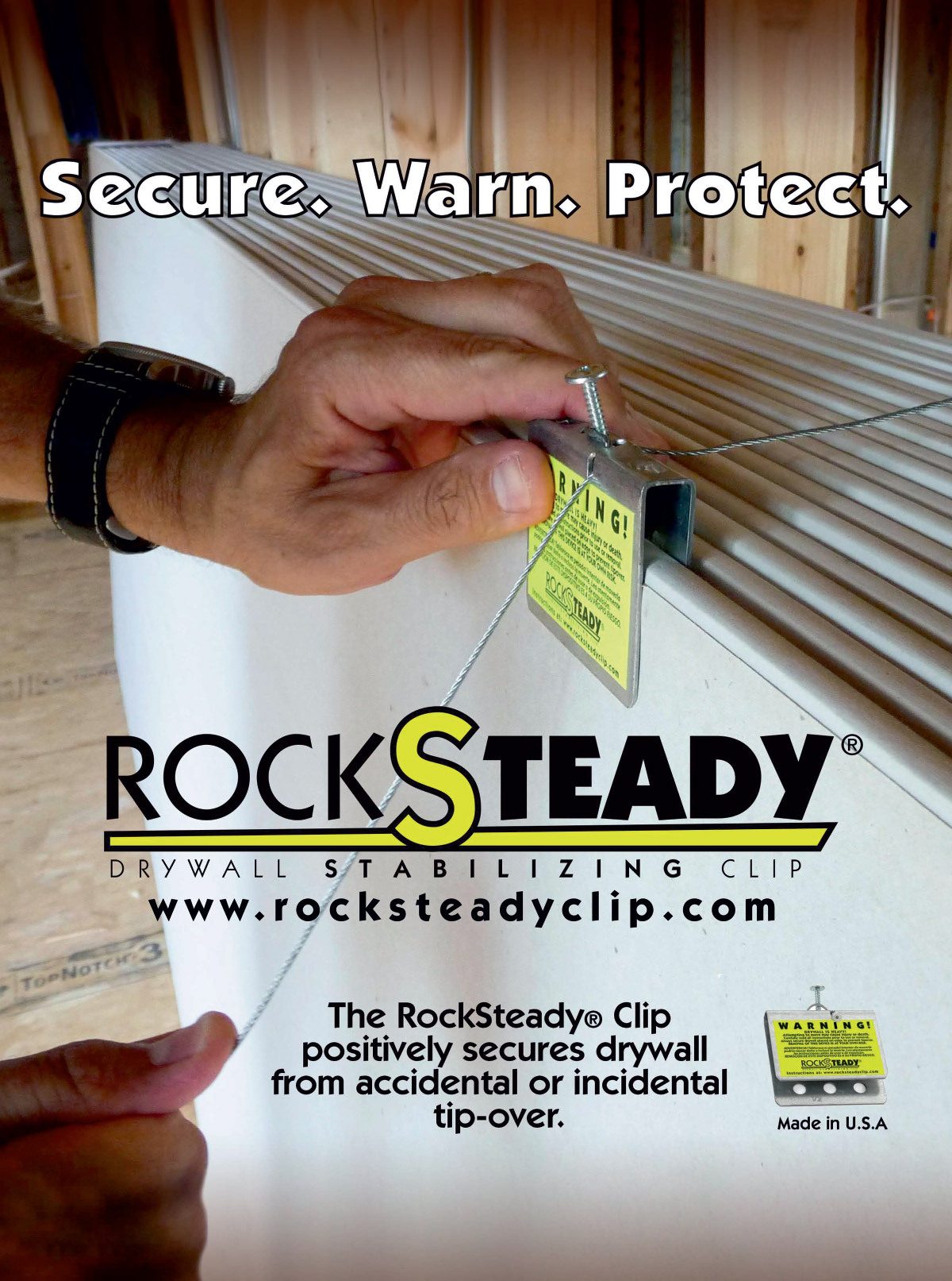 Hand securing drywall with a RockSteady clip, preventing accidental tip-overs. "Secure. Warn. Protect."