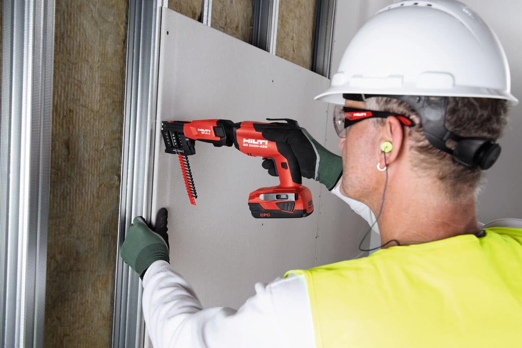 Hard hat, Hammer drill, Glasses, Tradesman, Workwear, Electrician, Yellow, Paint