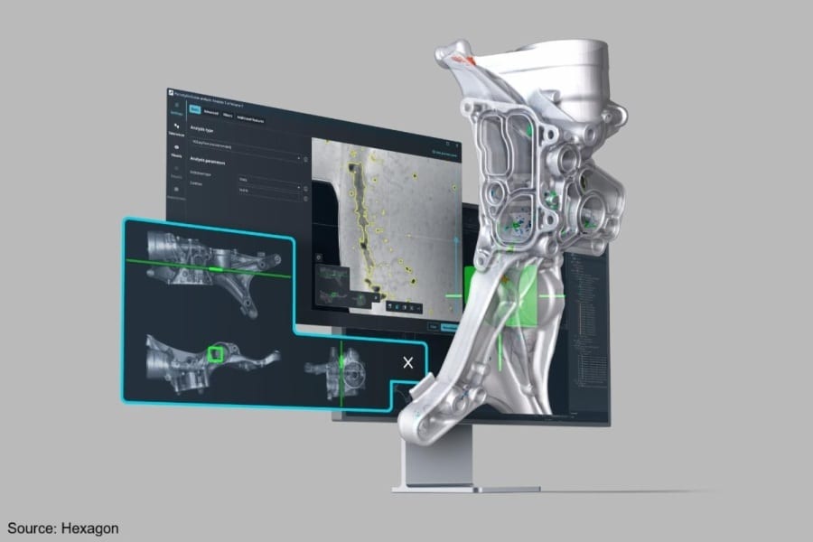 Hexagon software analyzing 3D mechanical parts on a screen, with a physical model.