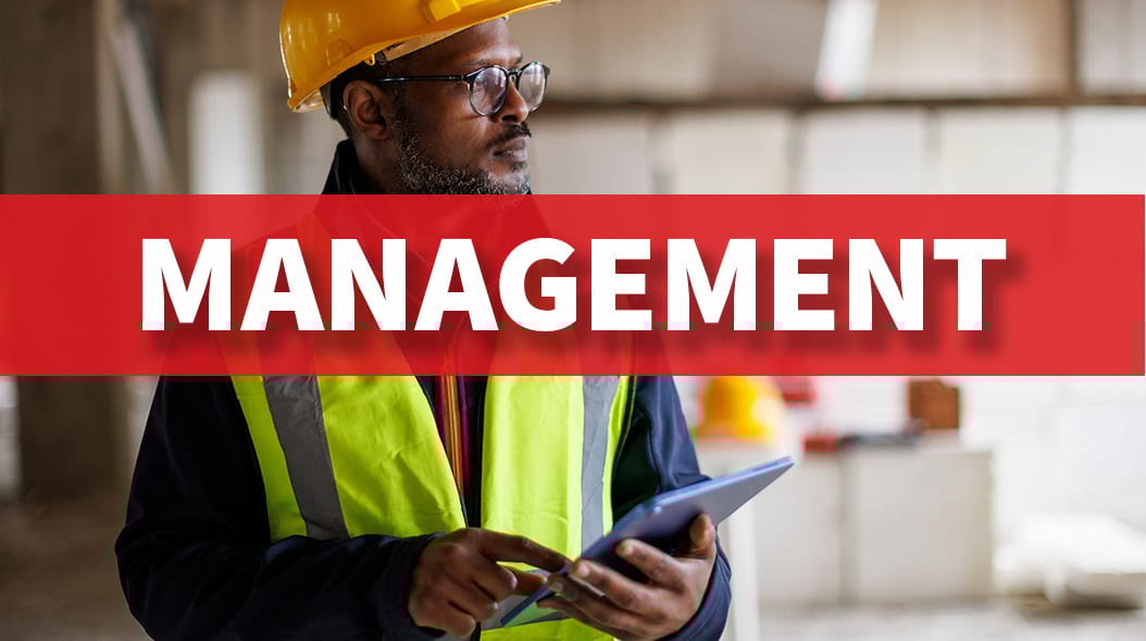Man in hard hat and safety vest with tablet. Overlay text: MANAGEMENT.