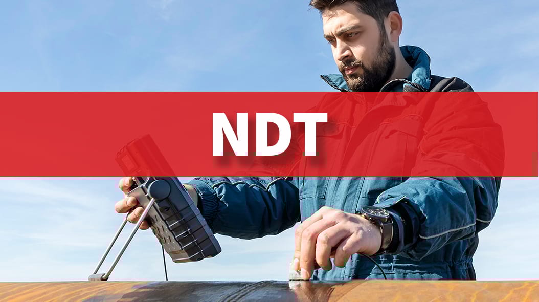 Engineer performs Non-Destructive Testing (NDT) on a pipe using specialized equipment.