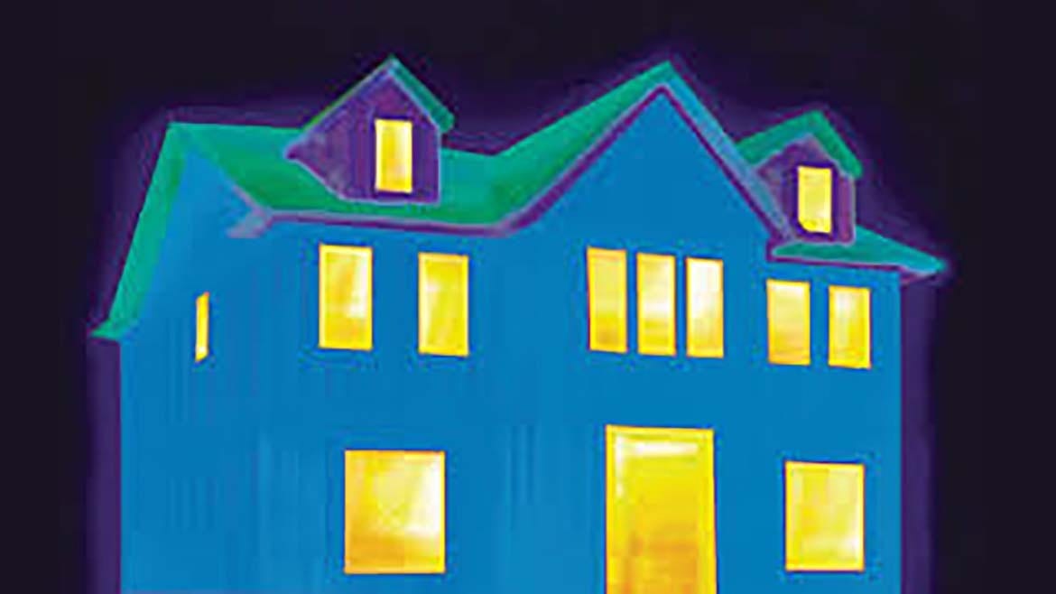 Thermal image of a house. Blue walls, green roof, yellow windows/door show heat loss.