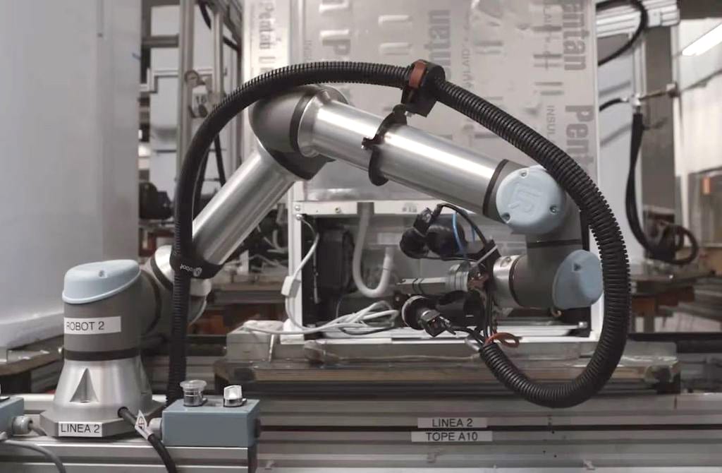 Universal Robot automating end-of-line refrigerator leak testing