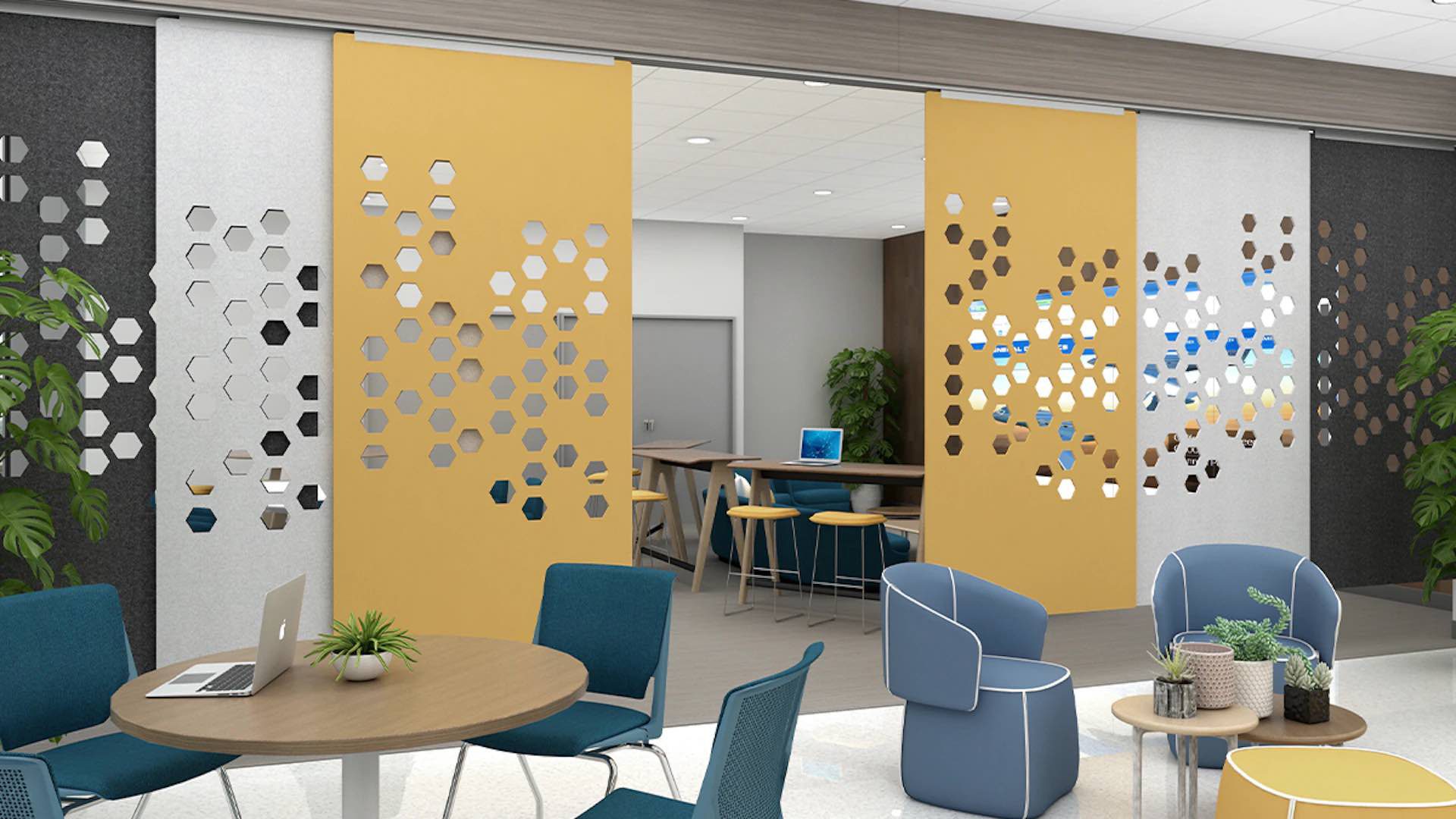 Office lounge with hexagonal pattern sliding partitions and various seating areas.