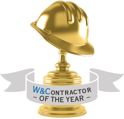Gold hard hat trophy with "W&C CONTRACTOR OF THE YEAR" on a ribbon.