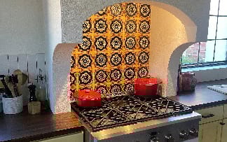 A Focal Point Range Hood with Function and Curves