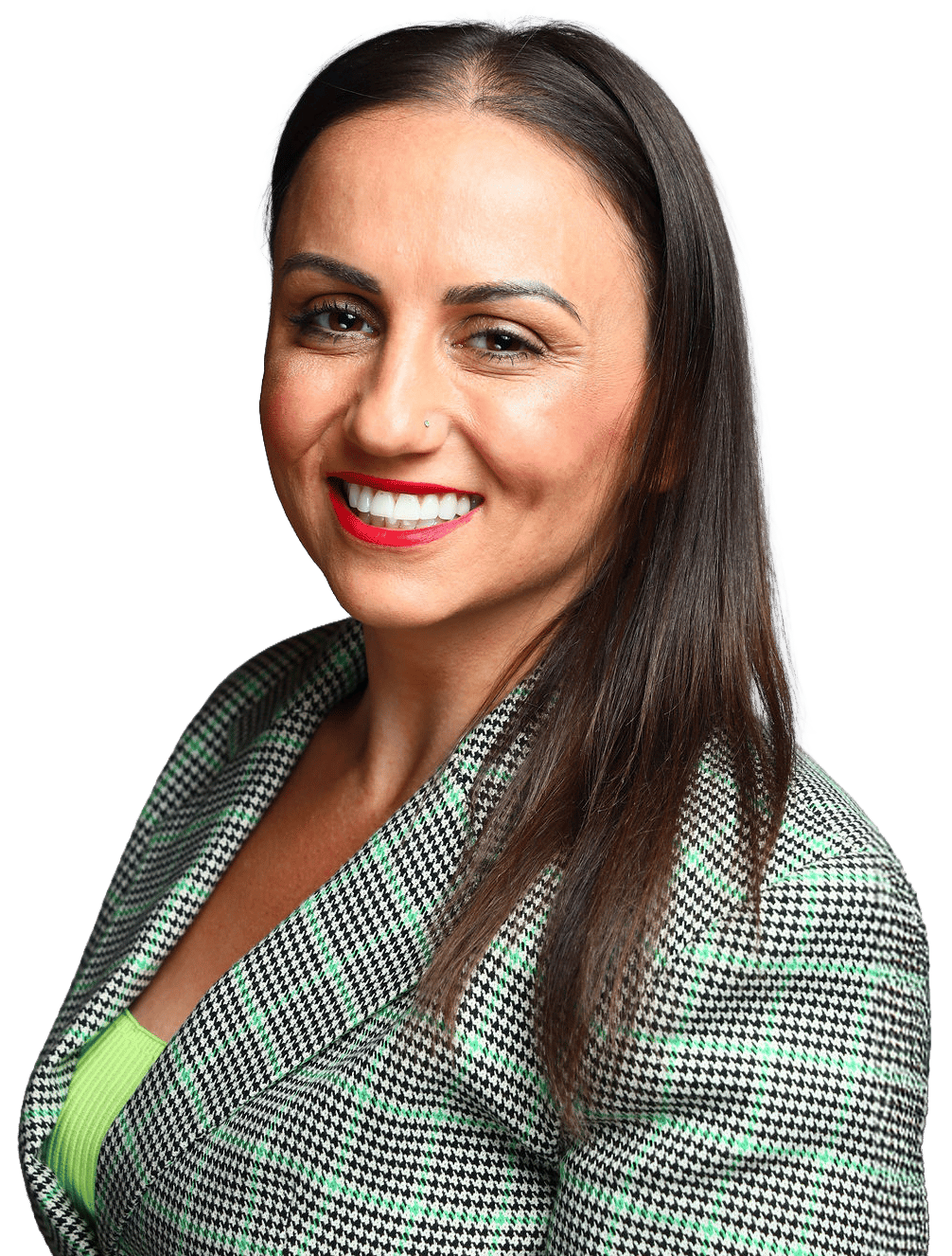 A smiling woman with long brown hair, red lipstick, and a checkered blazer, looking directly at the viewer.