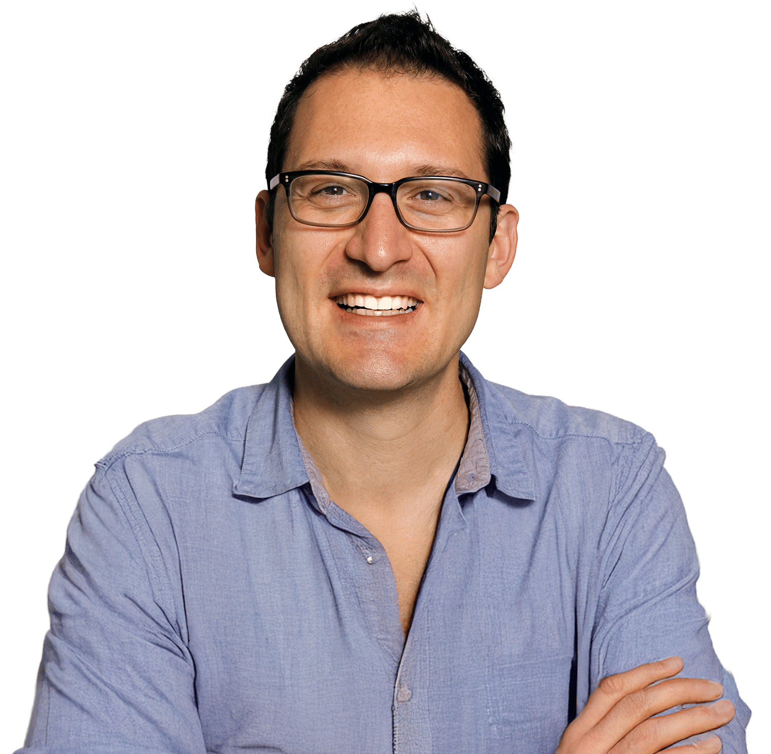 Smiling man with glasses and dark hair, wearing a blue shirt, arms crossed.