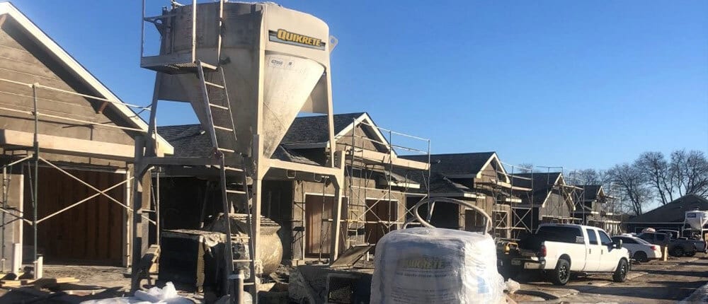 Pre-blended Stucco QUIKRETE Cos.