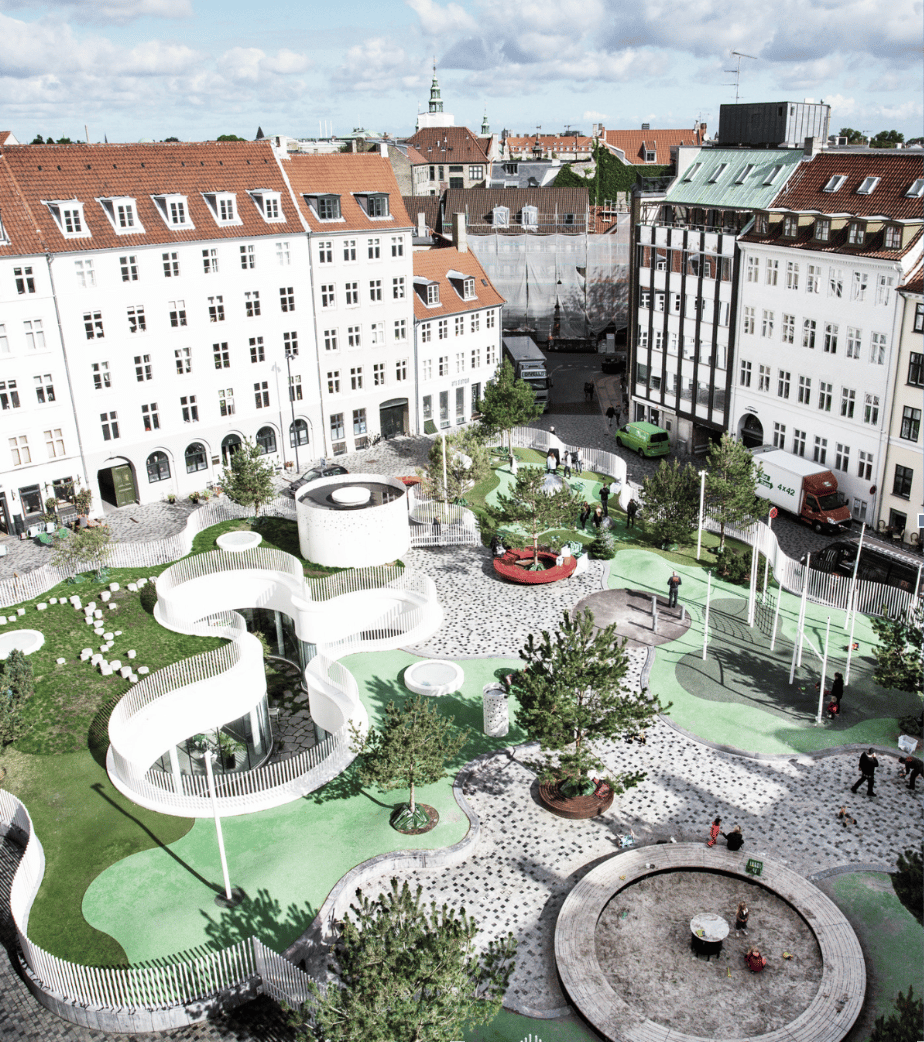 Urban design, Public space, Plant, Building, Property, Window, Sky, Architecture, Tree, Landscape