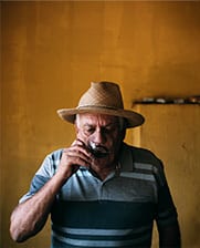 Sun hat, Clothing, Fedora, Sleeve, Beard, Gesture