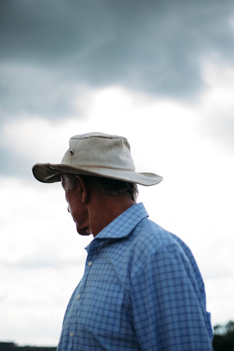Sun hat, Dress shirt, Flash photography, Cloud, Sky, Sleeve, Headgear, Collar