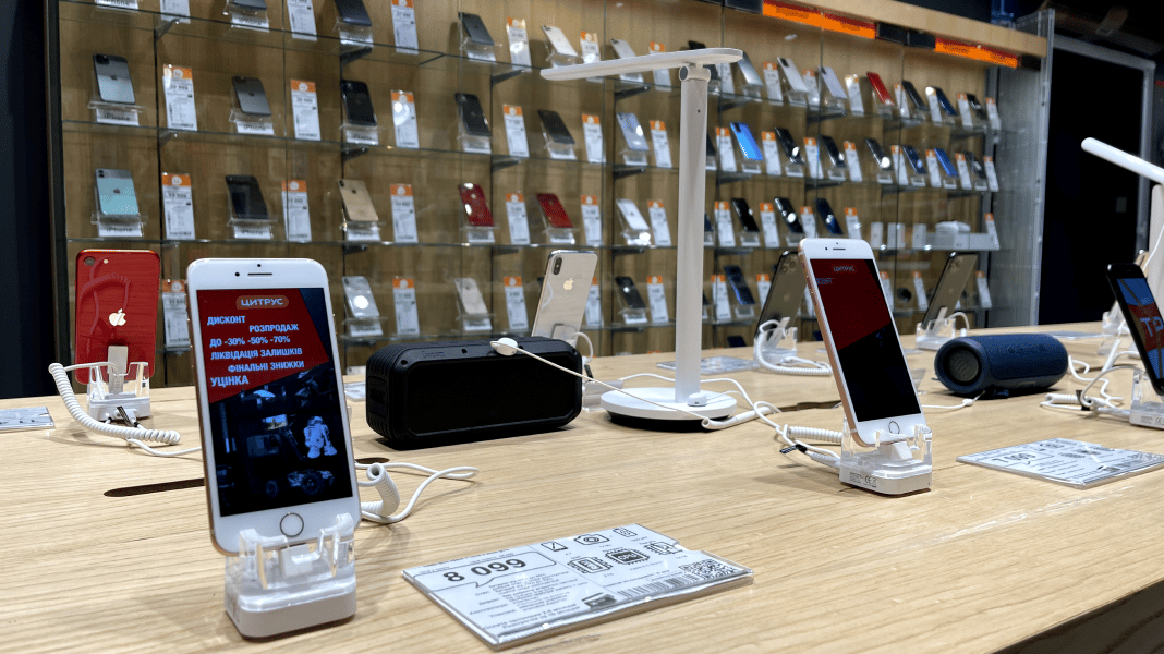 Communication Device, Mobile phone, Audio equipment, Table, Eyewear, Shelf, Desk, Building, Gadget