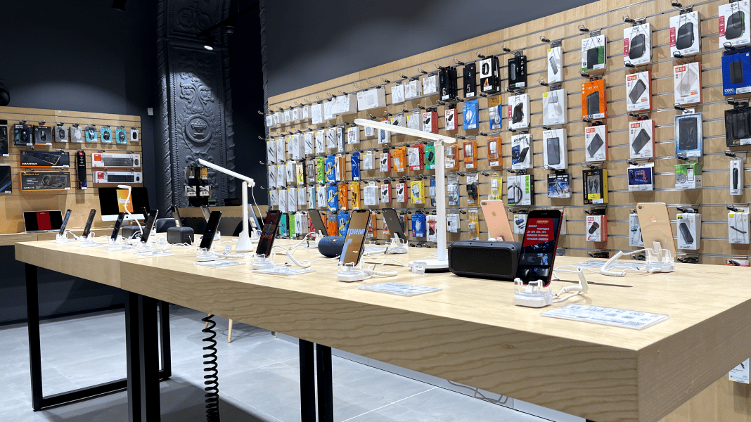 Interior design, Table, Eyewear, Shelving, Publication, Desk, Barware, Retail