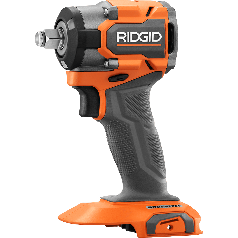 An orange and gray Ridgid brushless impact driver with a silver chuck on a green background.