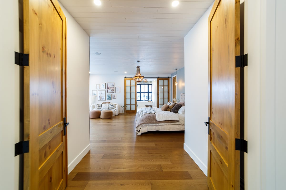 Interior design, Bed frame, Furniture, Building, Comfort, Wood, Flooring, Fixture, Floor, Door