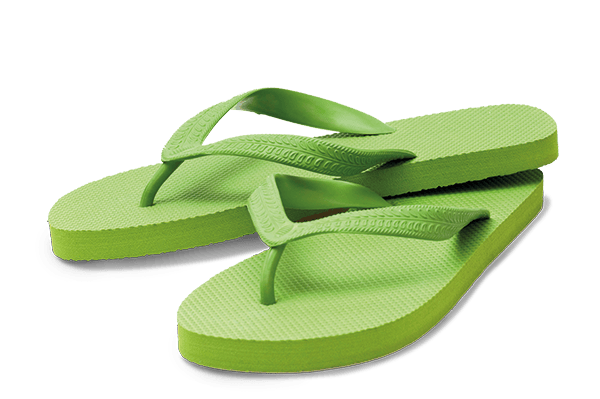 Two lime green flip-flops, one overlapping the other.