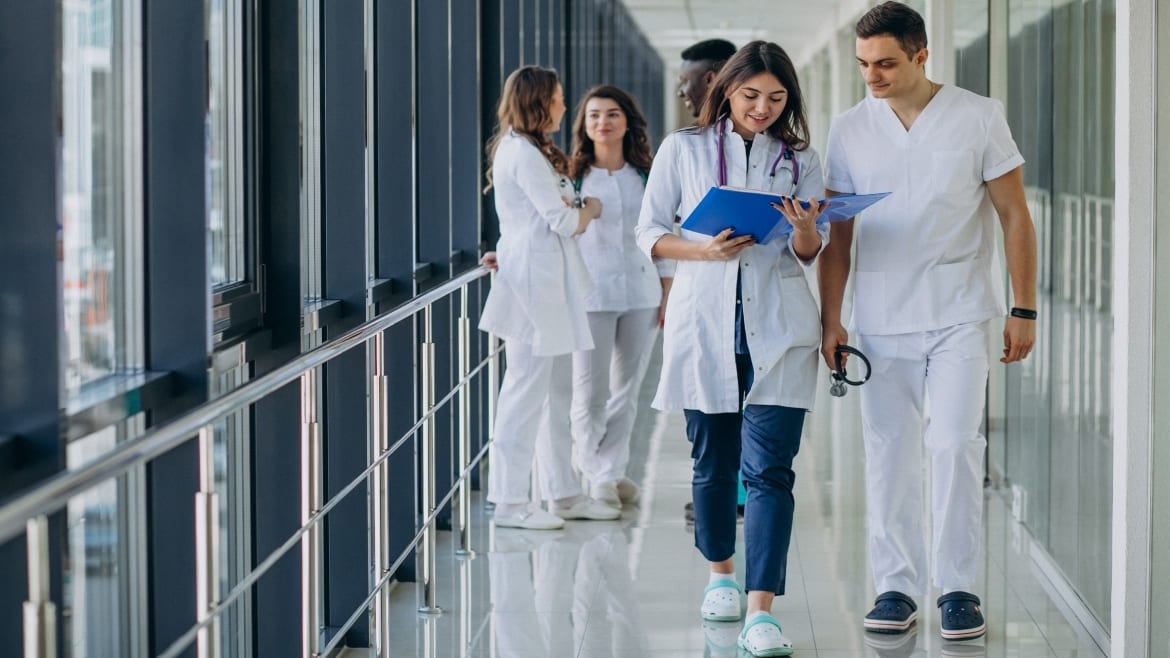 Health care provider, Trousers, Sleeve, Smile, Workwear