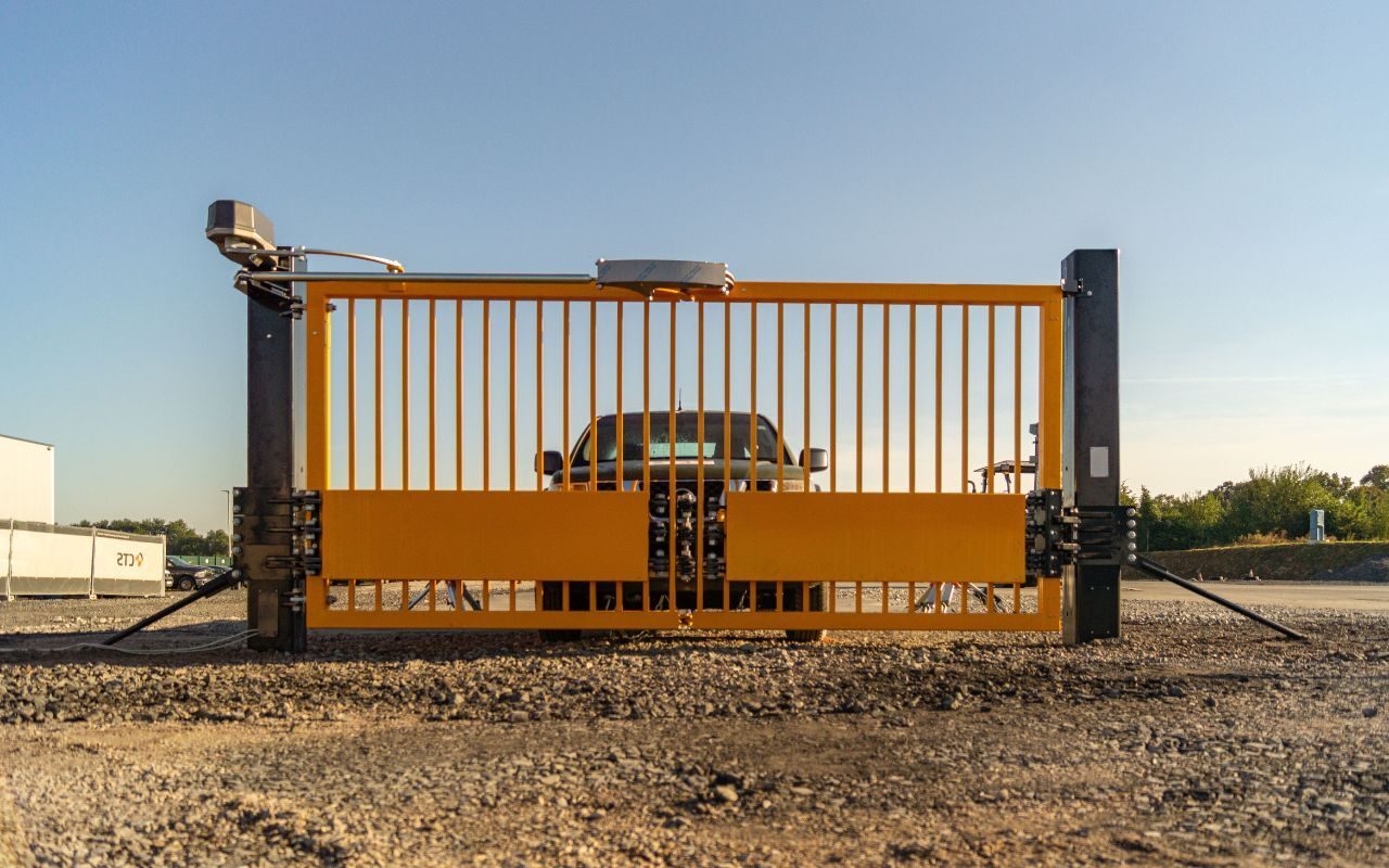 Mode of transport, Road surface, Sky, Asphalt, Wood, Track, Vehicle, Tire, Tree, Rolling