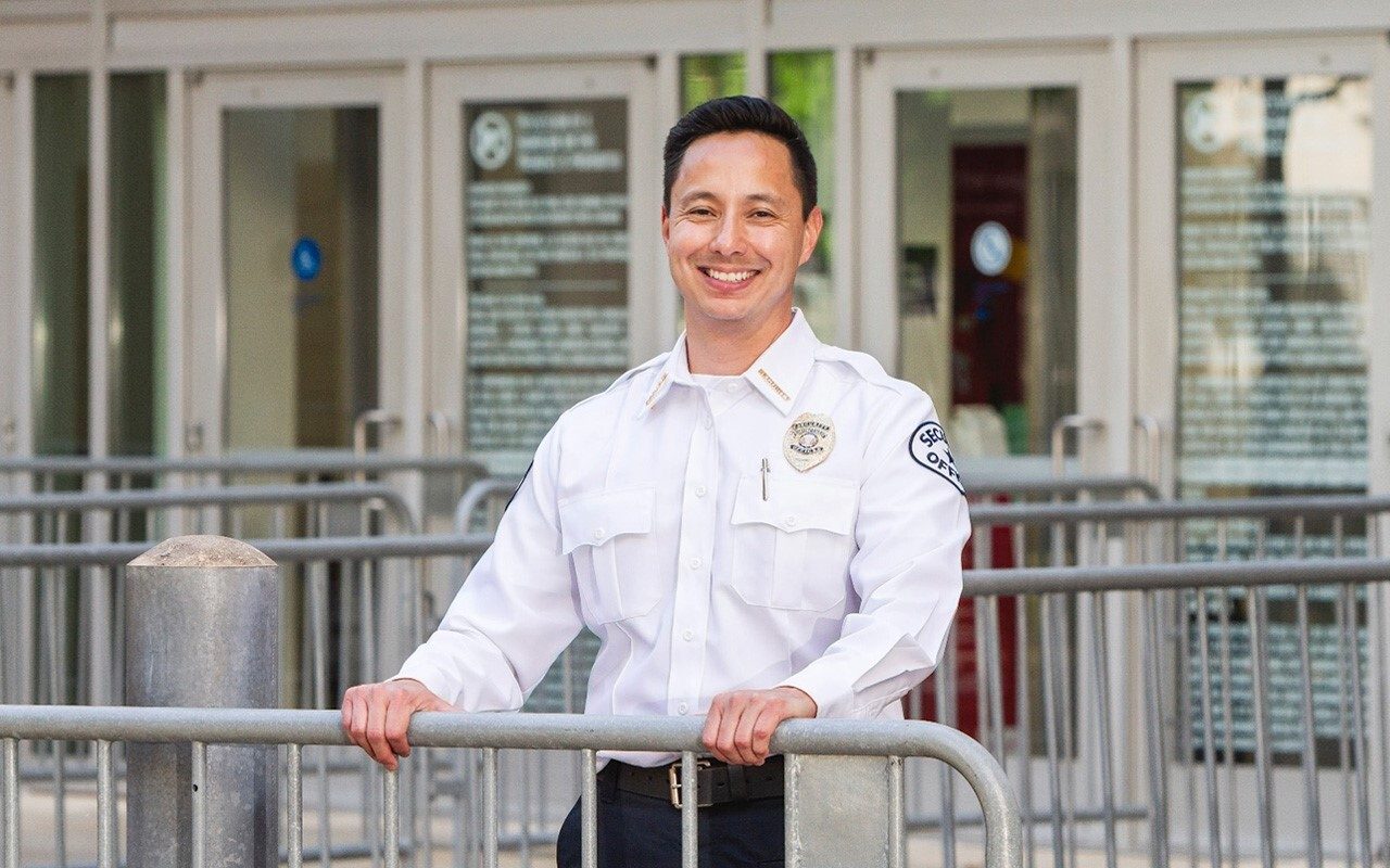 Dress shirt, Smile, Window, Sleeve, Fence, Building, Collar